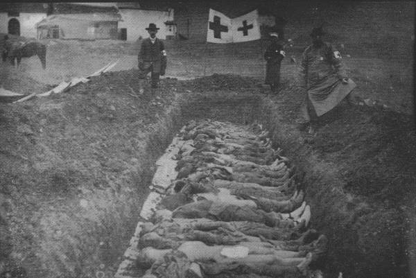 RED CROSS WORK IN CHINESE REVOLUTION

Red Cross workers at mass graves of men killed during the the Chinese
Revolution.