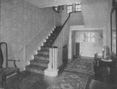 The Oriental rug used on the stairs harmonizes with those
used on the floor.