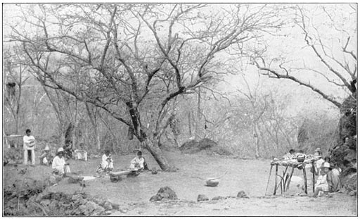 The Sacred Dancing-Place of the Coras, called Towta, the supposed residence of the great Taquat of the East of the same name. Photographed after the Dancing was over. The Main Altar is on the Right. The Musical Bow has been Removed from its Place in Front of the Bench.