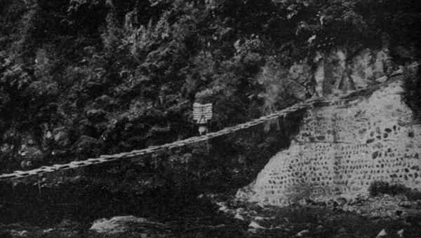 TEA-COOLIE CROSSING A SUSPENSION BRIDGE
His load weighed about 160 lbs