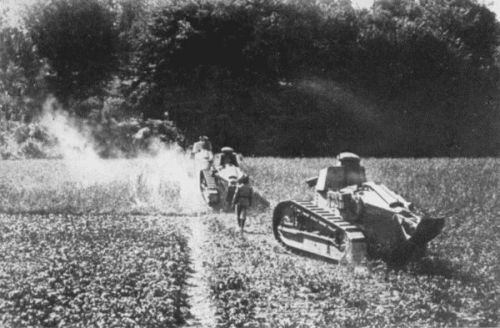 FIRST OF THE GREAT FRANCO-AMERICAN COUNTER-OFFENSIVE AT CHTEAU-THIERRY.
THE FRENCH BABY TANKS, KNOWN AS "CHARS D'ASSAUTS,"
ENTERING THE WOOD OF VILLERS-COTTERETS, SOUTHWEST OF SOISSONS