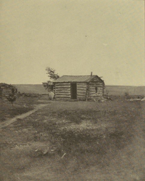 A TYPICAL LOG HOUSE