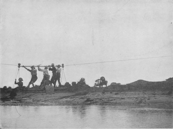 AN ARIAL FERRY—PROSPECTORS CROSSING COLORADO RIVER