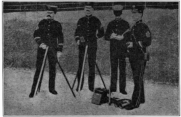 photograph of four men